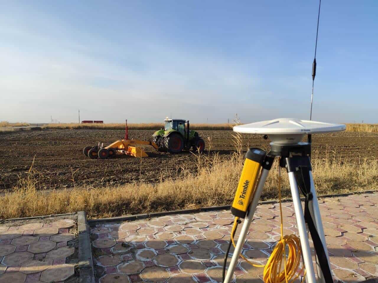 The Trimble AgGPS Geodesic base station that rTek uses can transmit RTK data to remote equipment for precision autosteering and landforming (Kyzylorda rice fields shown here)